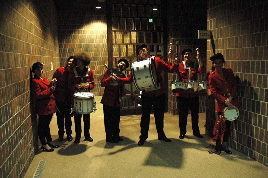 A little backstage fun as the drum-line stands at attention waiting to go in